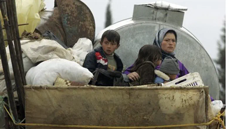 Syrian family flees into Lebanon