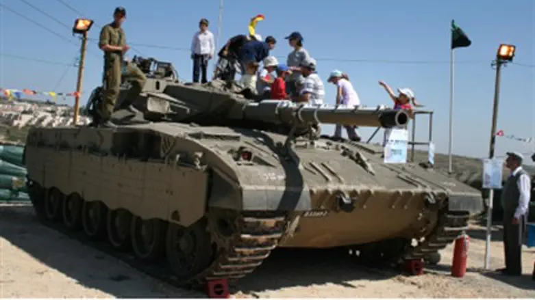 Children on tank (file)