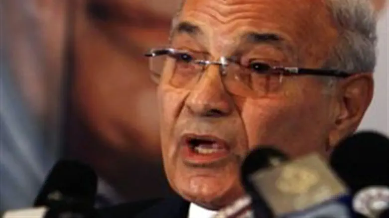 Ahmed Shafiq talks during a news conference