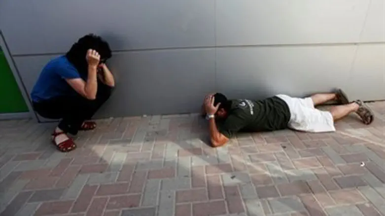 Children take cover from incoming rockets in 