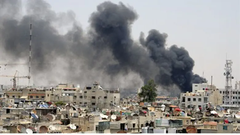 Smoke rises after bombing at Syrian Palace of