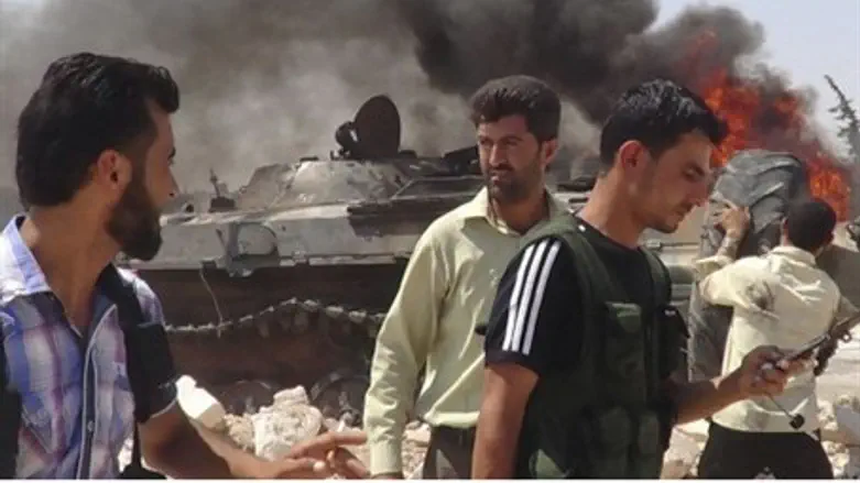 Rebels with damaged tank.