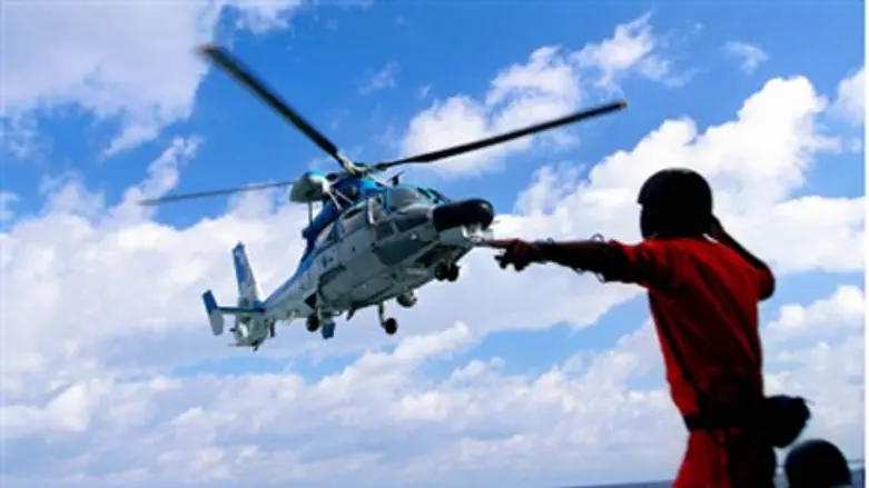 Helicopter lands on Sa'ar 5 corvette.