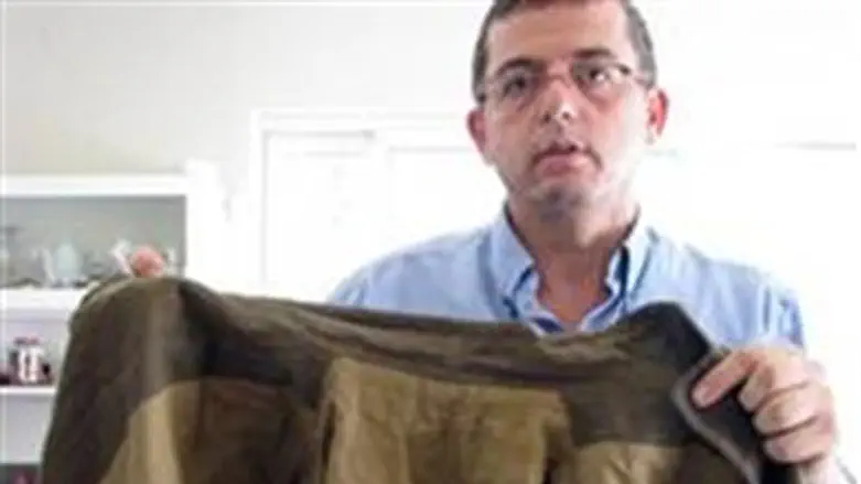 Moshe Teshuva with the coat