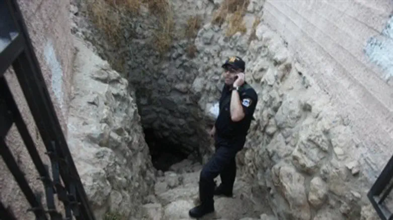 Security man at site of attack.