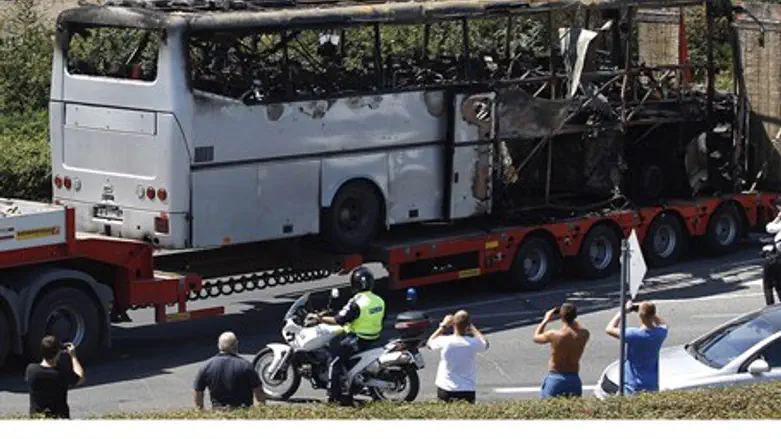 Removing remains of attacked bus