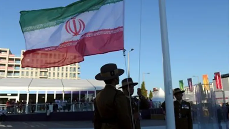 British Army soldiers raise the flag of the I
