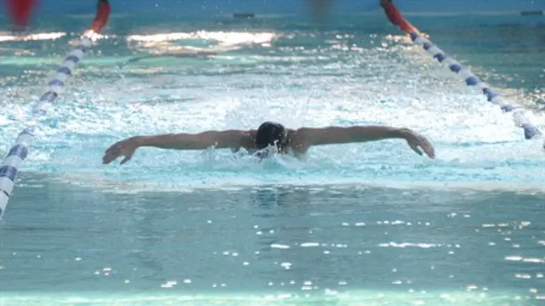 Cpl. Toumarkin swimming