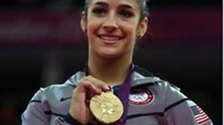 Raisman with gold medal