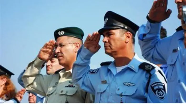 Police salute in honor of the slain