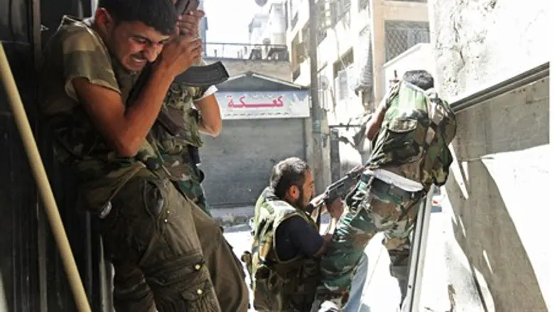FSA soldiers clash with gov't forces in Alepp