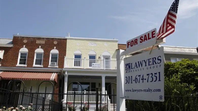 'For Sale' sign, signal of economic woes