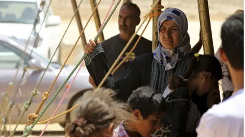 Refugees registering at za'atari camp