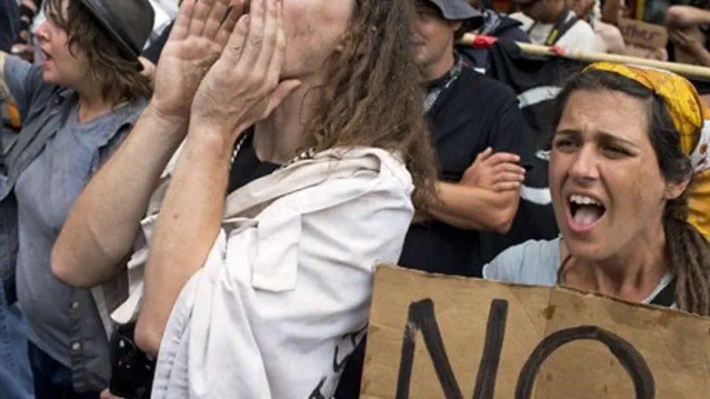 Protesters chant slogans against U.S. Preside