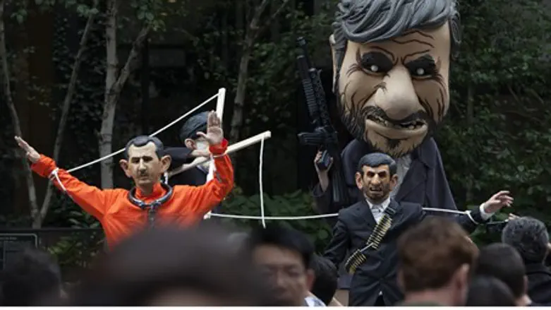 People dressed as Syrian President Bashar al-