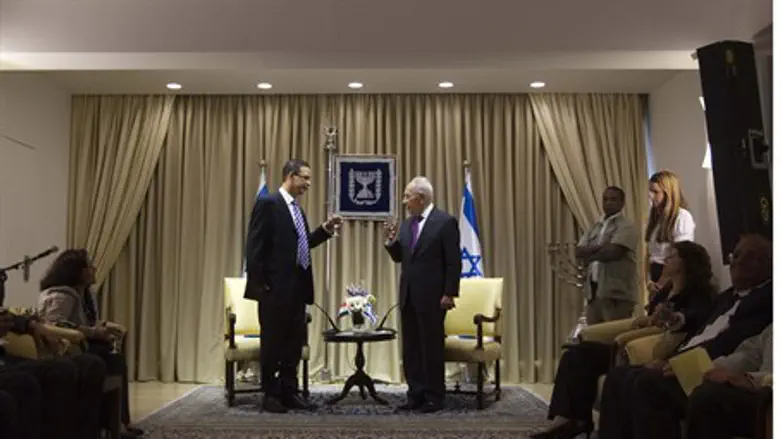 Israel's president greets Egypt's ambassador