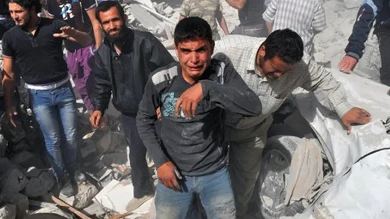 Syrian men react following an airstrike by Sy