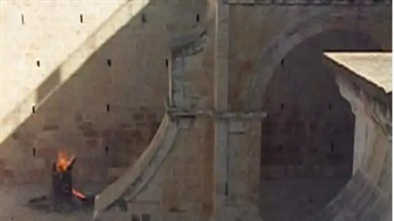 Ancient beams being burned on the Temple Moun