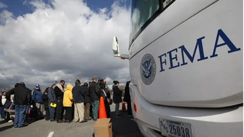 People wait in line to meet with FEMA officia