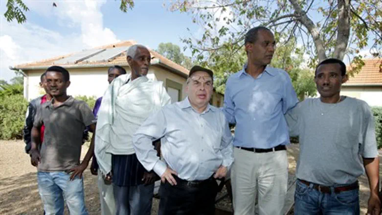Natan Sharansky with some residents of the Iv