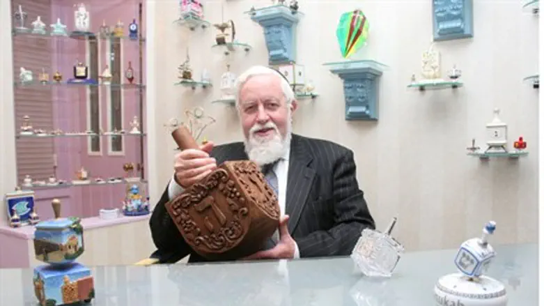 Rabbi Eliyahu Safran and his dreidel collecti
