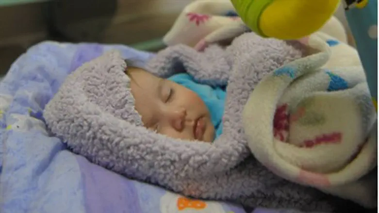 Спящий младенец