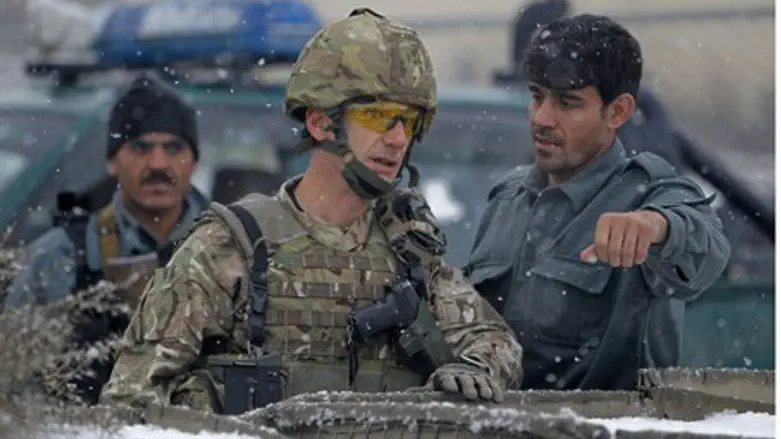 Afghan policemen and a NATO soldier