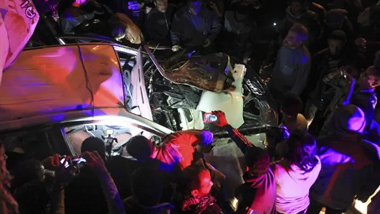 Wreckage of police car after bombing in Bengh