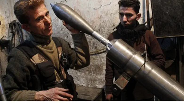 Syrian rebels fire mortar (file)
