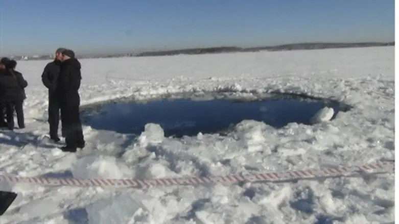 Russian police near the asteroid's probable p