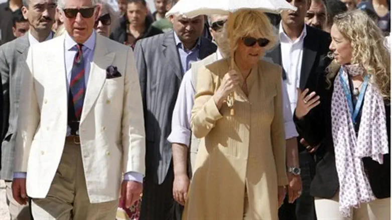 Britain's Prince Charles (L) and his wife Cam