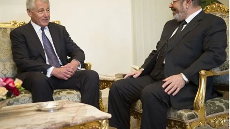 Hagel and Morsi (archive)