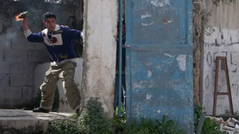 PA youth prepares to throw firebomb