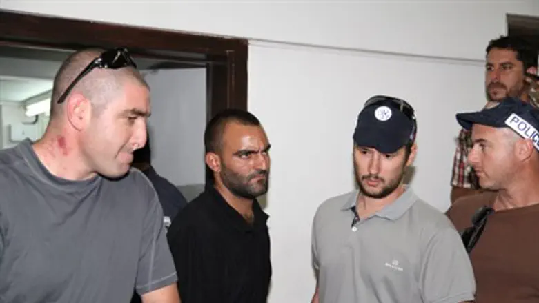 Felician (second from left) in court