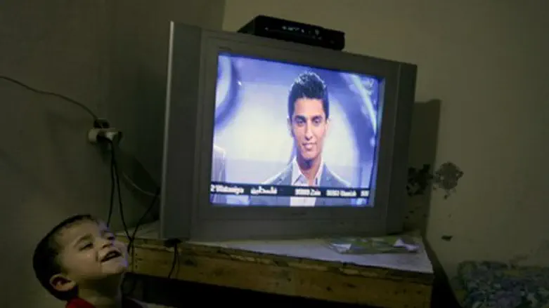 PA Arab kids watching singer Mohammad Assaf o