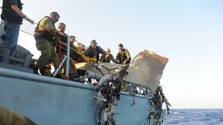 Pulling wreckage from the sea