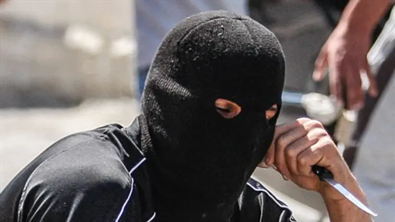Terrorist with knife (illustration)