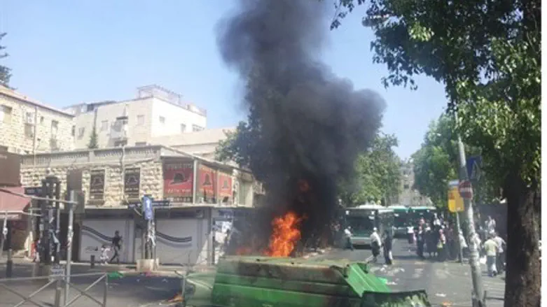 Burning garbage container