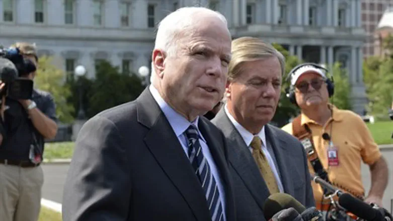 McCain talks to the media after meeting Obama