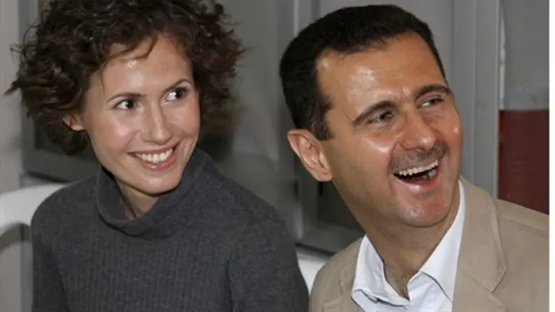 Bashar and Asma al-Assad (file)