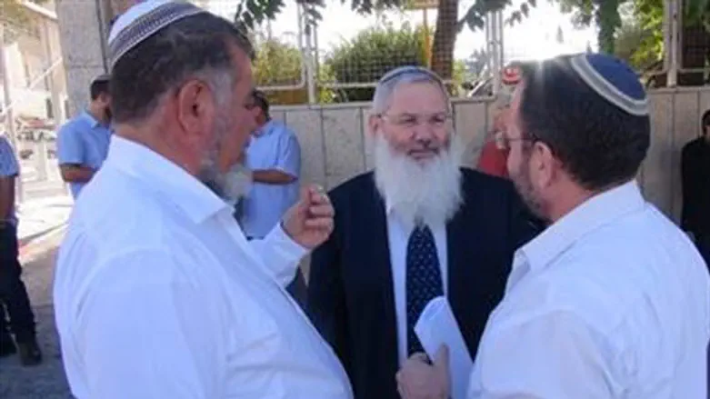 Ben-Dahan speaks to protesters