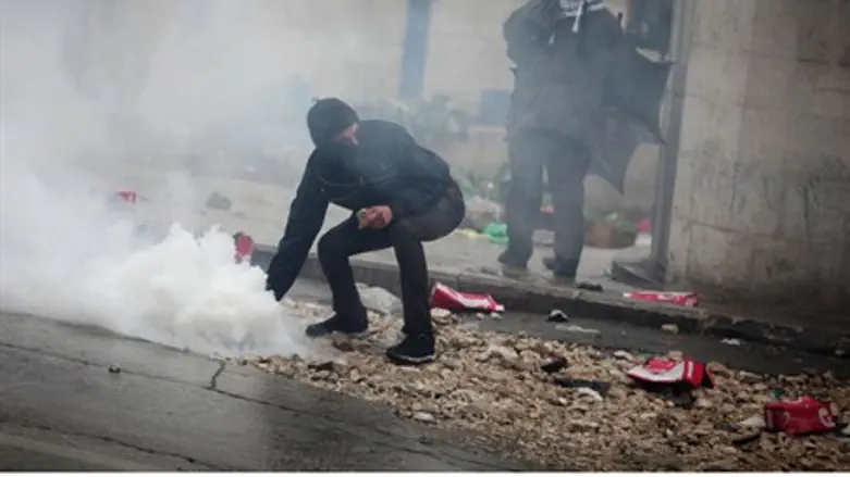 Rioters attack soldiers (file)