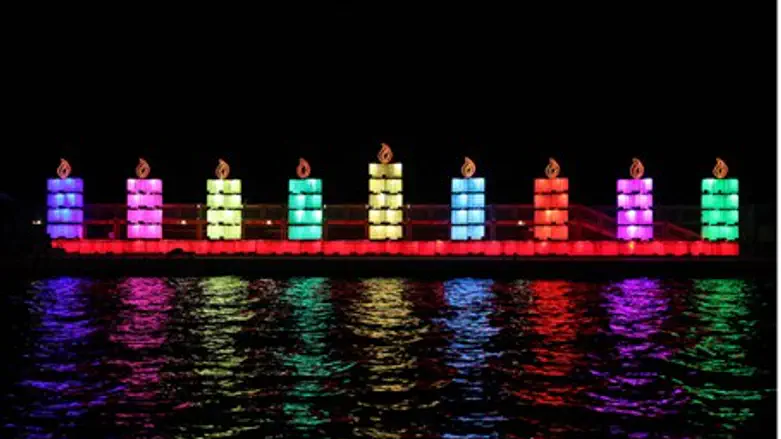 Illustration: giant menorah in Tel Aviv Port