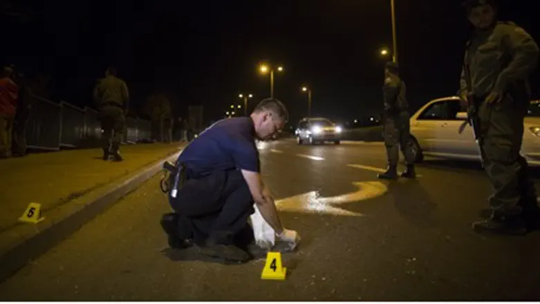 Investigators at the scene of attack