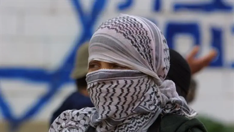 Arab man with face covered (illustrative)