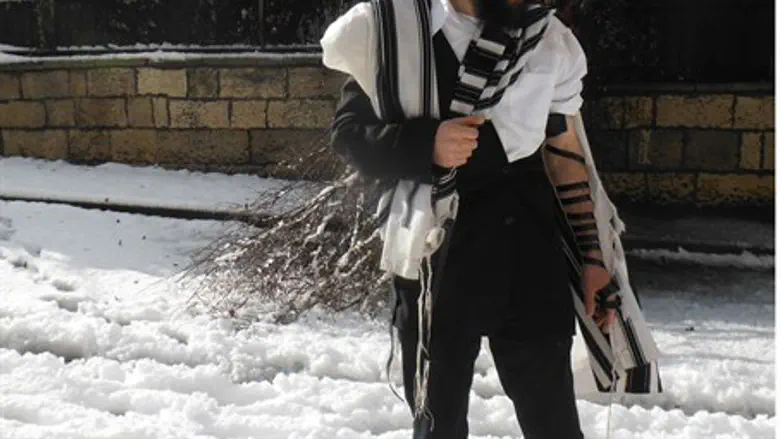 Rabbi in the snow in Jerusalem