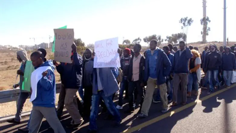 African infiltrators march through Jerusalem,