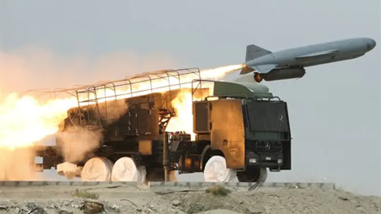 Iran's Revolutionary Guards fire a Saegheh mi