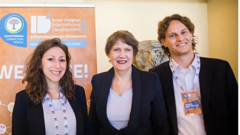 Helen Clark (center), with organizers