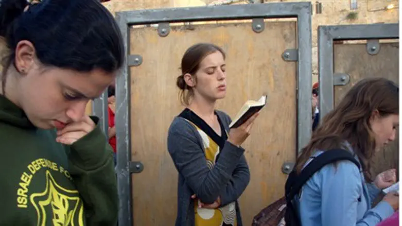 Praying at the Western Wall (illustrative)